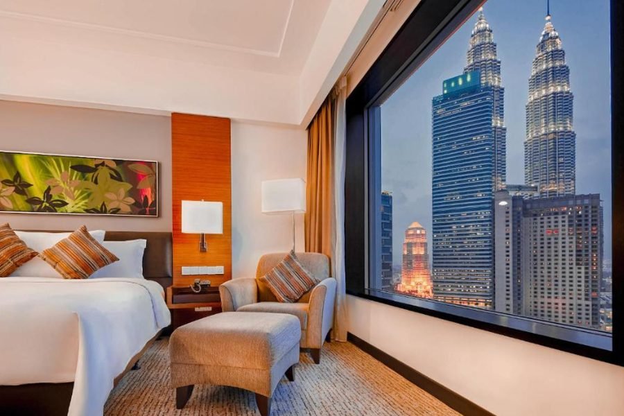 Guest room at Impiana KLCC Hotel with a view of the Petronas Twin Towers